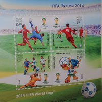 PM Modi releases commemorative postage stamps on 2014 FIFA World Cup